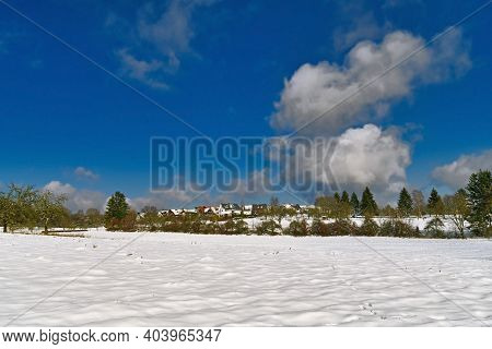 Clearing With Snow In Odenwald Forest During Winter With Blue Sky