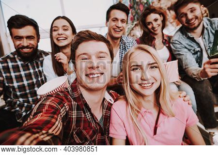Group Of Friends Are Taking Selfie At Home.