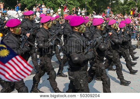 KUALA LUMPUR - AUGUST 31: Paskal, the Malaysian Navy special forces march on the city streets celebrating Malaysia's Independence Day on August 31, 2013 in Kuala Lumpur, Malaysia.
