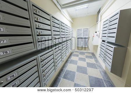 MOSCOW - DEC 10: Clean corridor with the postbox and the floor with a checkerboard pattern in one of the new houses on December 10, 2012 in Moscow, Russia.