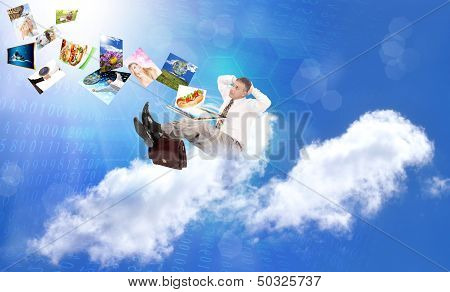 Businessman on the cloud. Internet concept