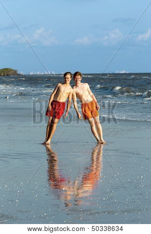 Teenager Enjoys Jogging Along The Beach