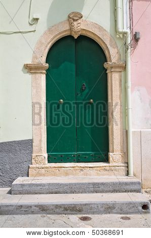 Wooden door. Rodi Garganico. Puglia. Southern Italy.