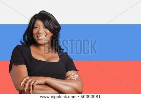 Portrait of casual mixed race woman over Russian flag