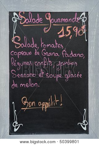 Menu Board With Advertisement At A French Restaurant