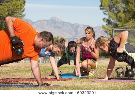 Mature Exercise Group With Trainer