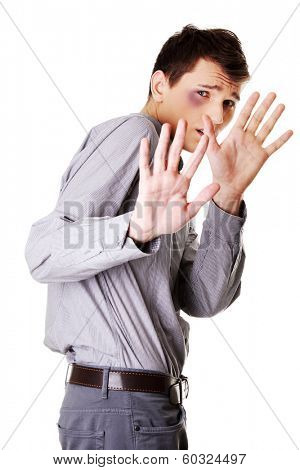 Young man being a Victim isolated on white