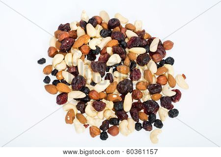 mixed nuts and dried fruits isolated on white background