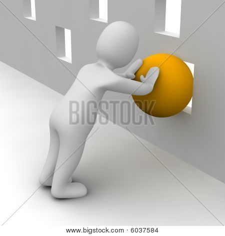 Man försöker push orange boll genom små hål