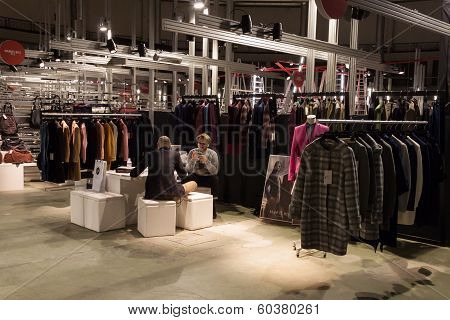 Exhibitors In Their Stand At Mipap Trade Show In Milan, Italy