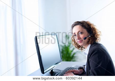 portrait of a beautiful young woman telephone operator