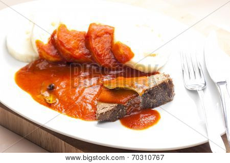 beef meat with tomato sauce