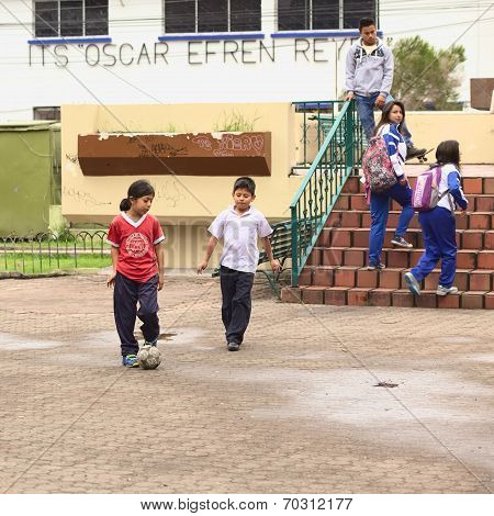 Children Playing Football in Banos, Ecuador