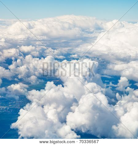 Clouds In Blue Sky And Earht Under Clouds