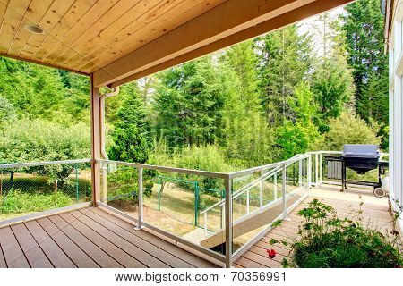 Wooden Walkout Deck With Glass Railing