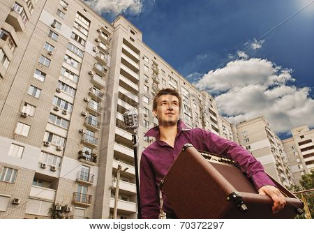 man with microphone and amp