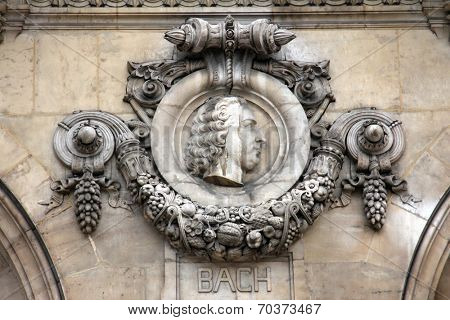 PARIS, FRANCE - NOVEMBER 08, 2012: Architectural details of Opera National de Paris: Bach Facade sculpture. Grand Opera is famous neo-baroque building in Paris, France - UNESCO World Heritage Site.