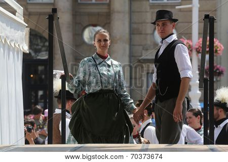 ZAGREB, CROATIA - JULY 19: Members of folk groups Nograd  from Salgotarjan, Hungary during the 48th International Folklore Festival in center of Zagreb, Croatia on July 19, 2014