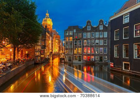 Night City View Of Amsterdam Canal, Church And Bridge