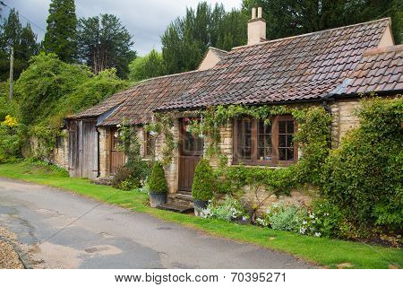 CHIPPENHAM, UK - AUGUST 9, 2014: Castle Combe village. Old house