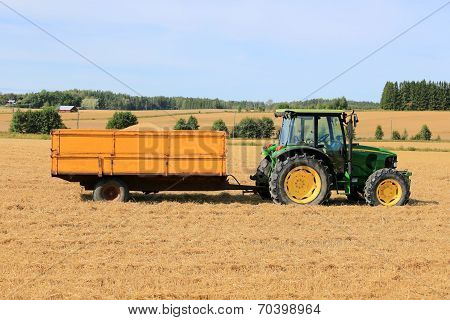 John Deere 5820 Agricultural Tractor With Trailer Full Of Grain