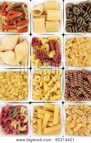 Pasta food shapes in square porcelain dishes.