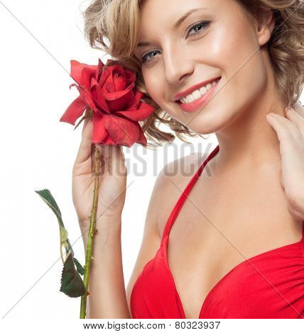 closeup portrait of attractive  caucasian smiling woman blond isolated on white studio shot lips toothy smile face hair head and shoulders looking at camera blue eyes tooth red rose flower