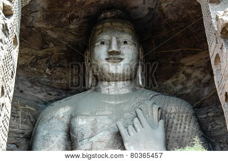 A  spectacular bodhisattva sitting in a big cave
