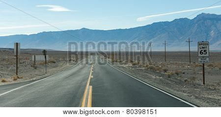 Straight road in desert