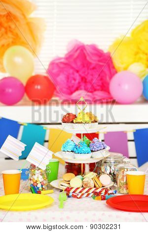 Prepared birthday table with sweets for children party