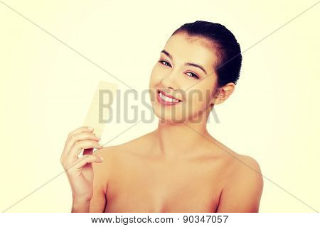 Beautiful woman holding a waffer