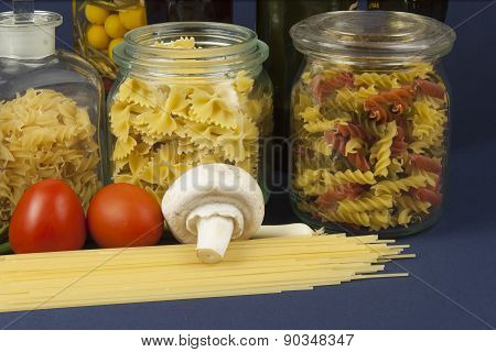 Various types of pasta on the table, homemade food preparation