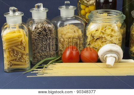 Various types of pasta on the table, homemade food preparation