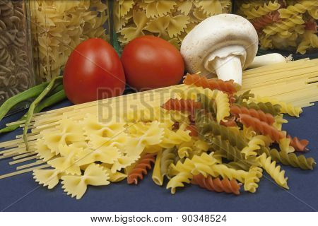 Various types of pasta on the table, homemade food preparation