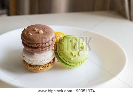 Orange, White, Brown Green Magaroon