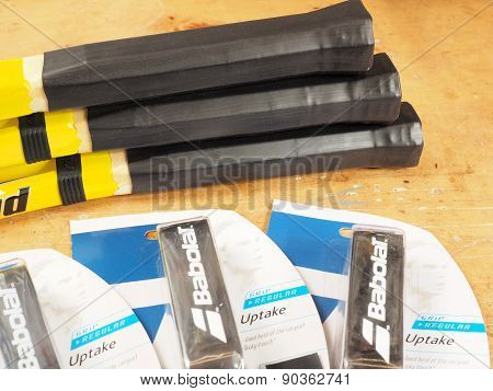 Finished upsized Tennis racquet handles after application of heat shrink