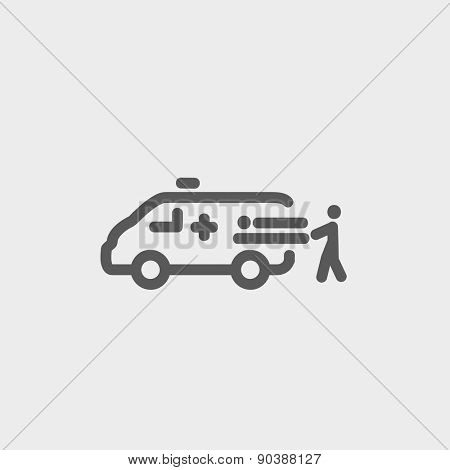 Man and ambulance car icon thin line for web and mobile, modern minimalistic flat design. Vector dark grey icon on light grey background.