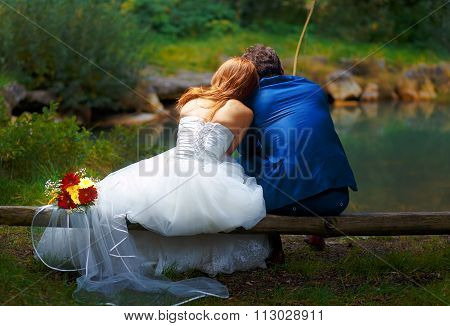 bride and groom fishing together - romantic wedding concept.