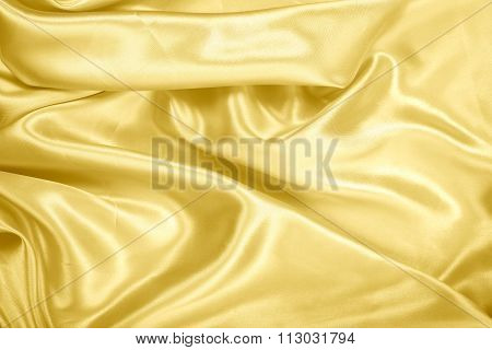 Gold Fablic Satin On Background Texture.