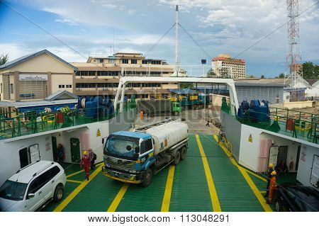 LABUAN FT, MALAYSIA - DEC 26, 2015: Ferry with vehicles on board in the morning on Dec 26, 2015.