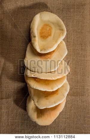 A row of arabic flat bread - kuboos.