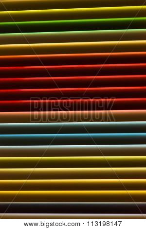 Colorfull metal window blinds. Roller shutter background. Part of a metal blind with multiple colour