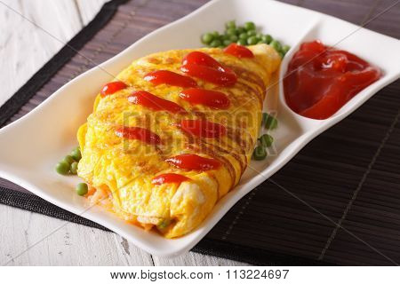 Delicious Omelette With Ketchup Close-up On A Plate. Horizontal