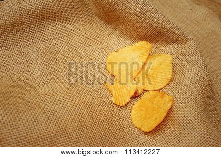 Potatoes Sheet On Background Of Brown Wooden