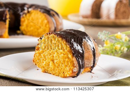 Carrot Cake With Chocolate And Slice On The Table