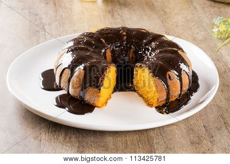 Carrot Cake With Chocolate And Slice On The Table