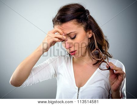 Attractive Young Woman With A Headache