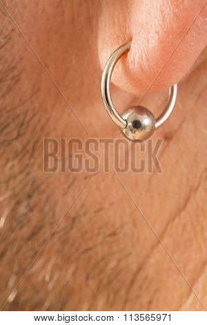 pierced ear of a  man