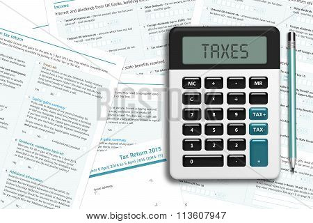 Uk Tax Form With Calculator Lying On Wooden Desk