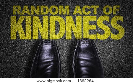 Top View of Business Shoes on the floor with the text: Random Act of Kindness